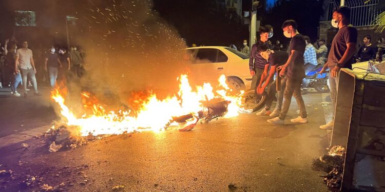 Protesters rally across Iran in third week of unrest over Amini’s death