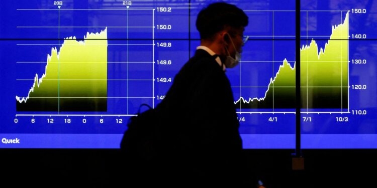 Shares mixed on Fed warning, China acts on property