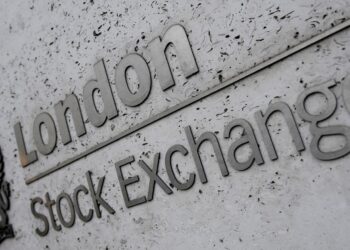 Stocks pause near five-month peaks on note of caution