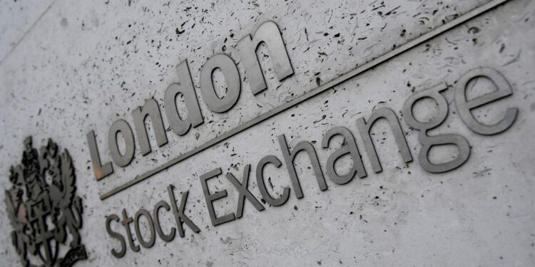 Stocks pause near five-month peaks on note of caution