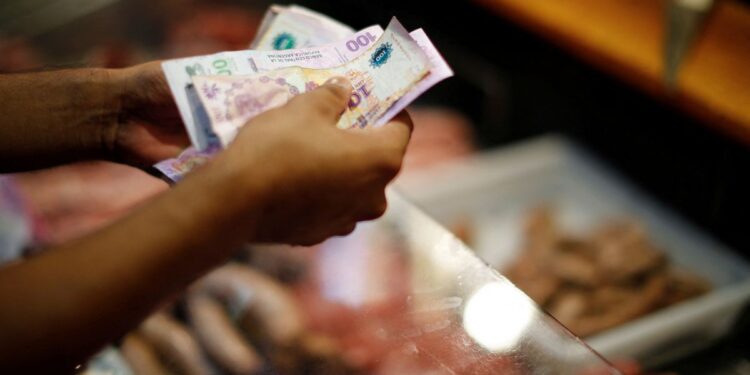 Argentina orders public sector to give up dollar bonds in debt shake-up