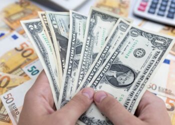 Dollar falls with central bank policy in focus; markets weigh OPEC+ cuts