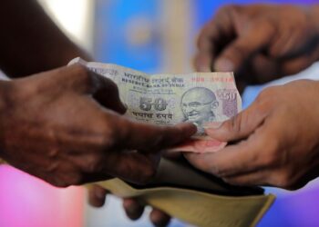 Indian rupee to nudge higher at open, avoiding losses in Asian peers