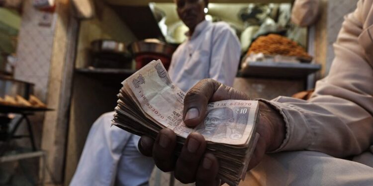 Rupee may decline slightly on weak risk, dollar uptick