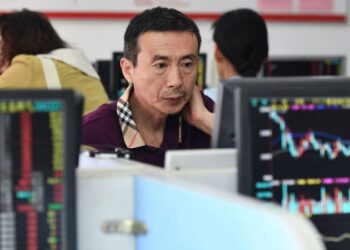 Chinese stocks get brief uplift from first share dealing tax cut since 2008