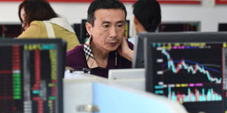 Chinese stocks get brief uplift from first share dealing tax cut since 2008