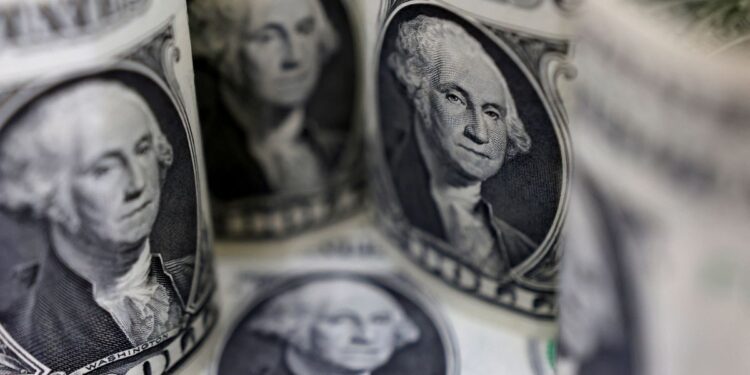 Dollar index dips, briefly hits 9-month high against yen