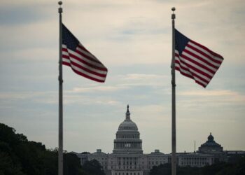 Survey: US rates higher for longer