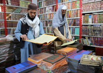 Phones, Islamic books and currency exchange. Some businesses are making money out of Taliban rule
