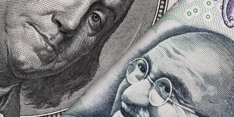 Indian Rupee Falls To Record Low Against US Dollar