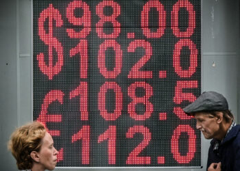 Russians Line Up To Buy US Dollars As Ruble Plummets After New Sanctions