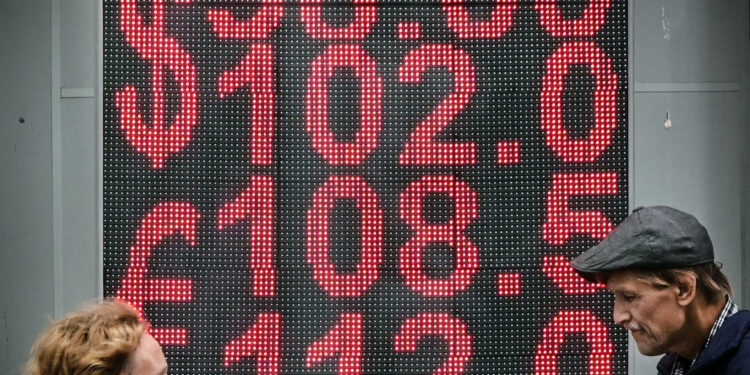 Russians Line Up To Buy US Dollars As Ruble Plummets After New Sanctions