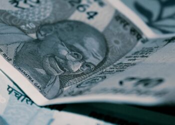 Rupee turns flat at 84.07 against US dollar