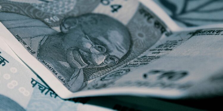 Rupee turns flat at 84.07 against US dollar