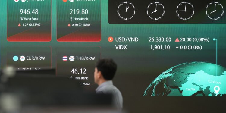 Asian shares trade mixed as AI excitement fades and war worries continue