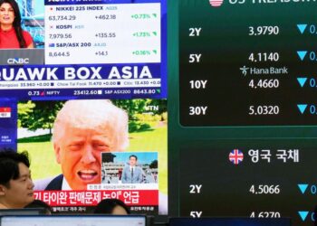 World shares mostly gain as investors watch Trump-Xi summit | Business