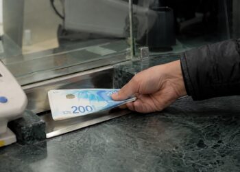 Thousands of foreign workers caught in collapse of Israeli money transfer company