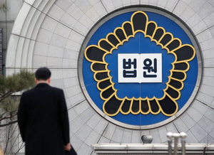 Defector charged over remittances to families in North Korea is acquitted