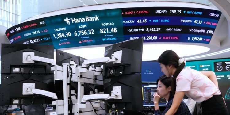 Asian shares mostly rise as oil prices fall and hope grows for AI
