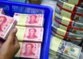China steadies yuan as exporters feel currency squeeze