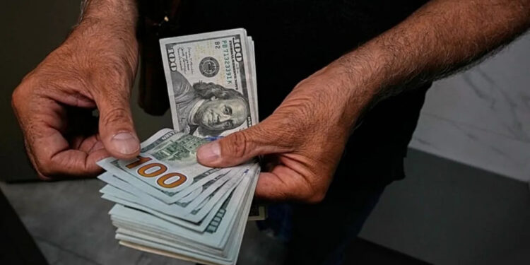 Iranian rial in freefall as dollar breaks 2.1 million mark